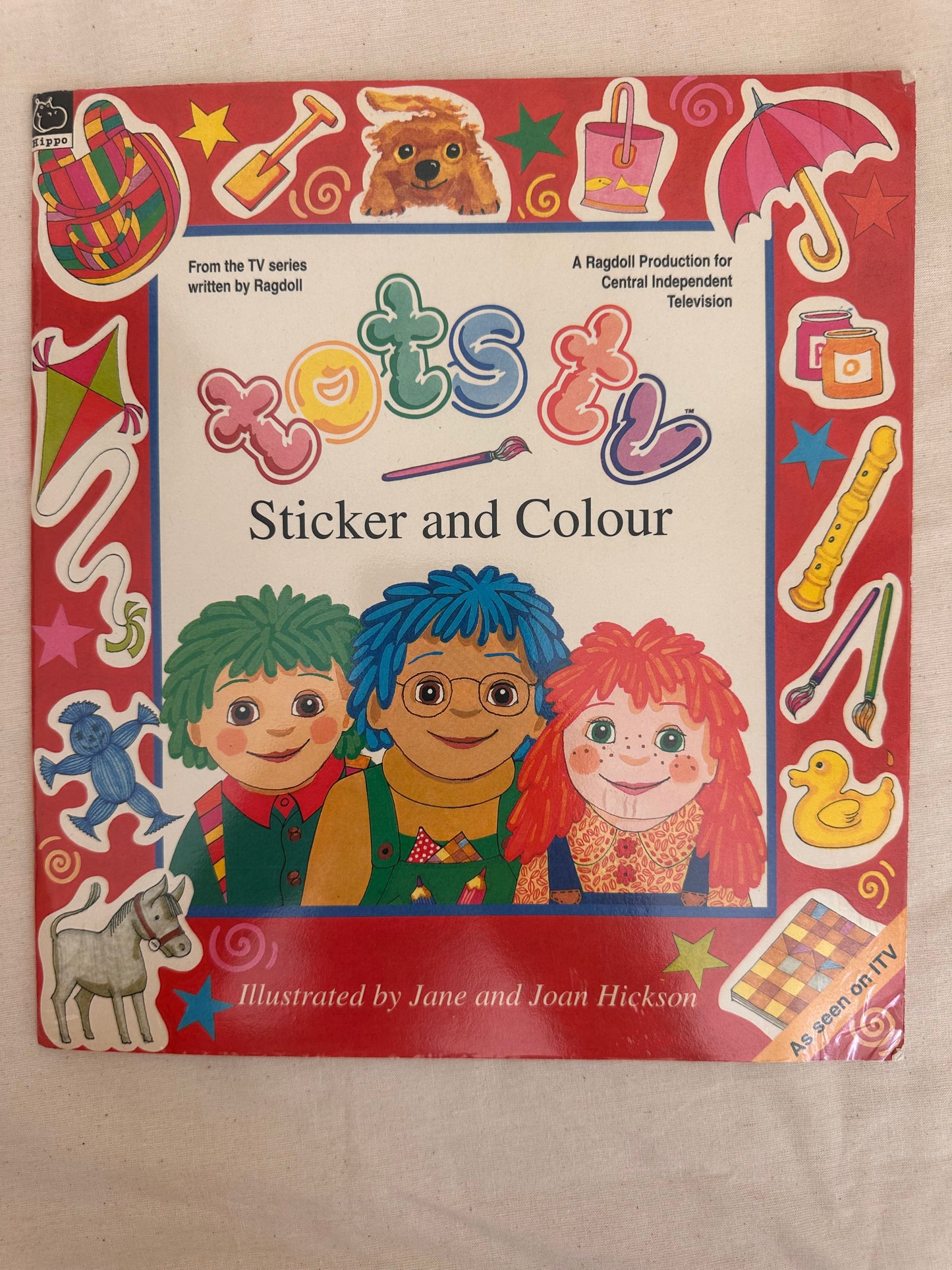 Tots TV sticker and colour book